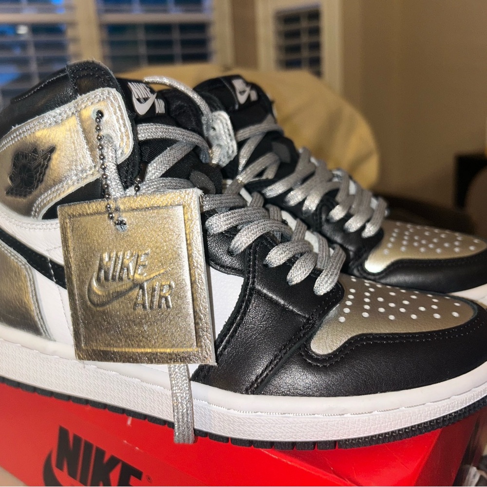 Nike silver and black 1’s